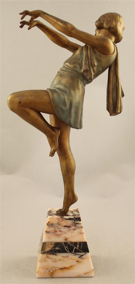 A French Art Deco patinated and cold painted metal figure of a dancing girl, 15.5in.